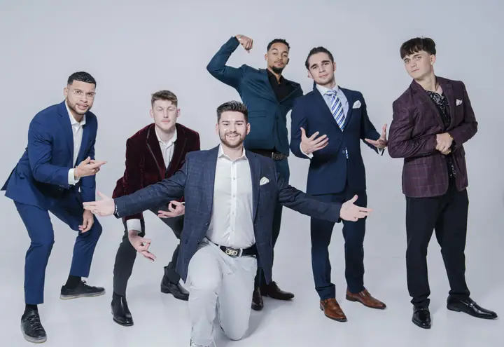 Studio portrait of a team in suits